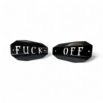 Motorcycle hand guards with the saying "Fuck Off" cut into the black powder-coated outer shell bolted to a chrome powder coated mount.