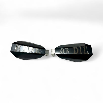 Motorcycle hand guards with the saying "Ride or Die" cut into the black powder-coated outer shell bolted to a chrome powder coated mount.